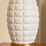 Carica l'immagine nella visualizzazione Galleria, Close-up of sculpted white ceramic lamp base