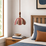 Cargar imagen en el visor de la Galería, Red and ivory striped fabric pendant lamp installed beside a bed