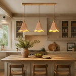 Cargar imagen en el visor de la Galería, Natural triple pendant above a kitchen island