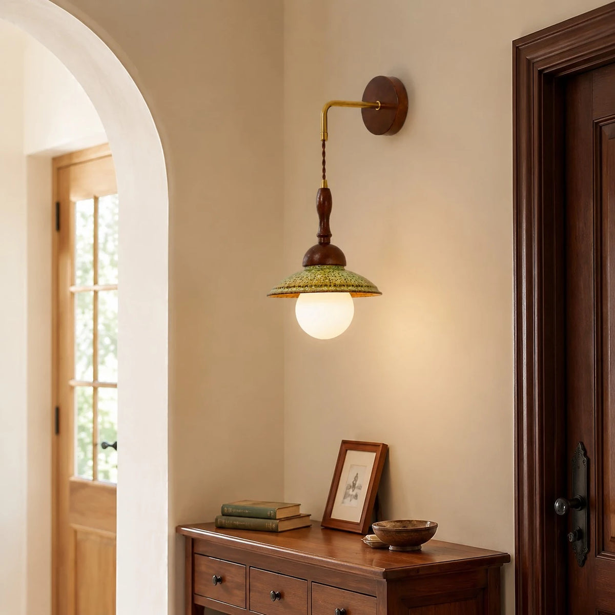 Japanese vintage wall sconce installed in an entry hallway beside a wooden door