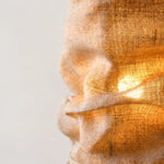 Załaduj obraz do przeglądarki galerii, Close-up of gathered burlap texture and warm glow