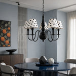 Cargar imagen en el visor de la Galería, Black polka dot chandelier above a modern dining table