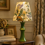 Cargar imagen en el visor de la Galería, Beige floral table lamp in a classic bedside setting