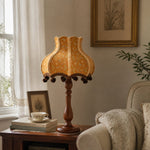 Cargar imagen en el visor de la Galería, Vintage fabric table lamp beside a reading chair and window