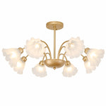 Załaduj obraz do przeglądarki galerii, Gold-finished iron eight-arm floral glass chandelier on a white background