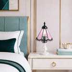 Cargar imagen en el visor de la Galería, Cherry blossom pink stained glass table lamp on a nightstand beside a bed