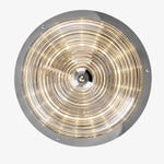 Cargar imagen en el visor de la Galería, Bottom view of concentric rippled glass pattern with warm light