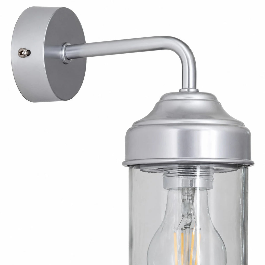Close-up of aluminum canopy, arm and glass shade